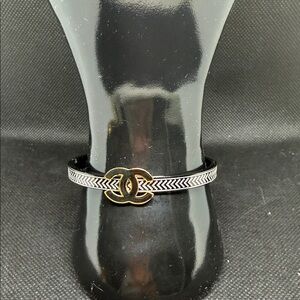 ✅ PRICE IS FIRM ✅ Fashion Black and Gold Bracelet with Logo